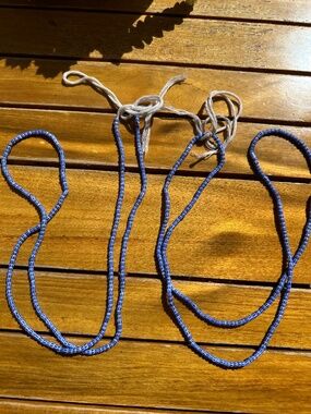 Beautiful set of two long blue-and-white striped glass bead necklaces